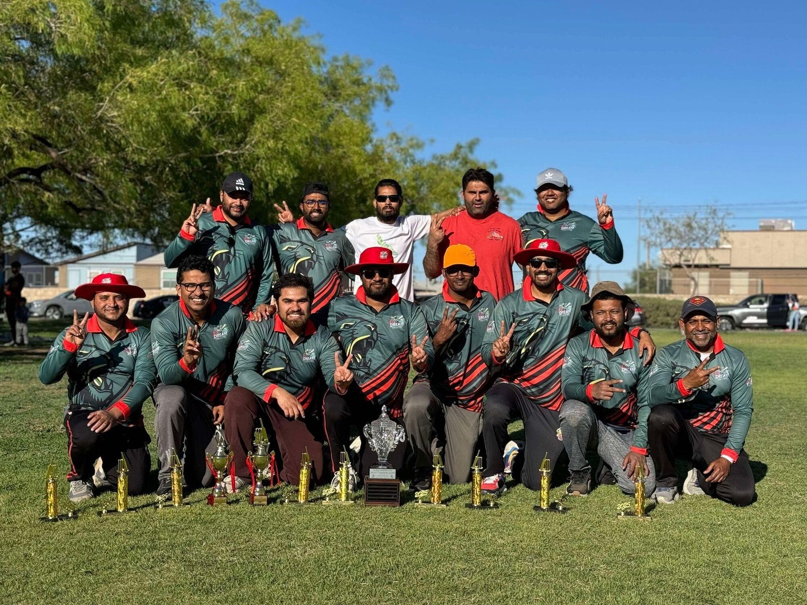 Dream Team hardball cricket players with their trophies